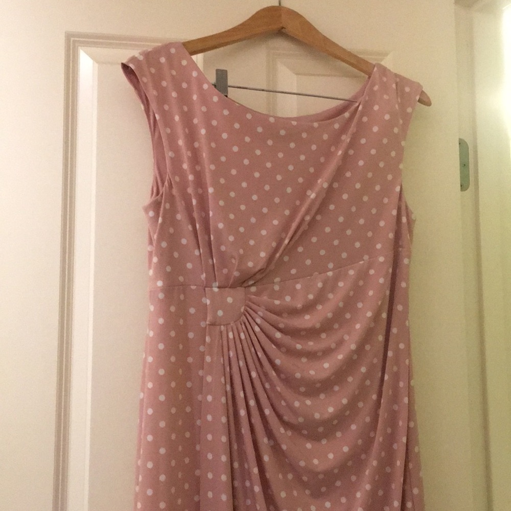 Pink and white polka dot faux wrap dress.